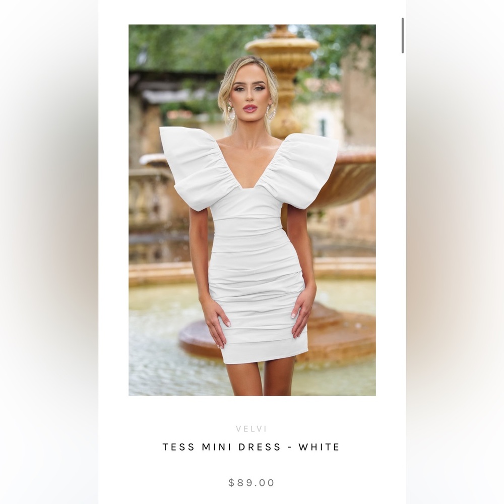 White dress, over shoulder, Lady Black Tie. Never worn